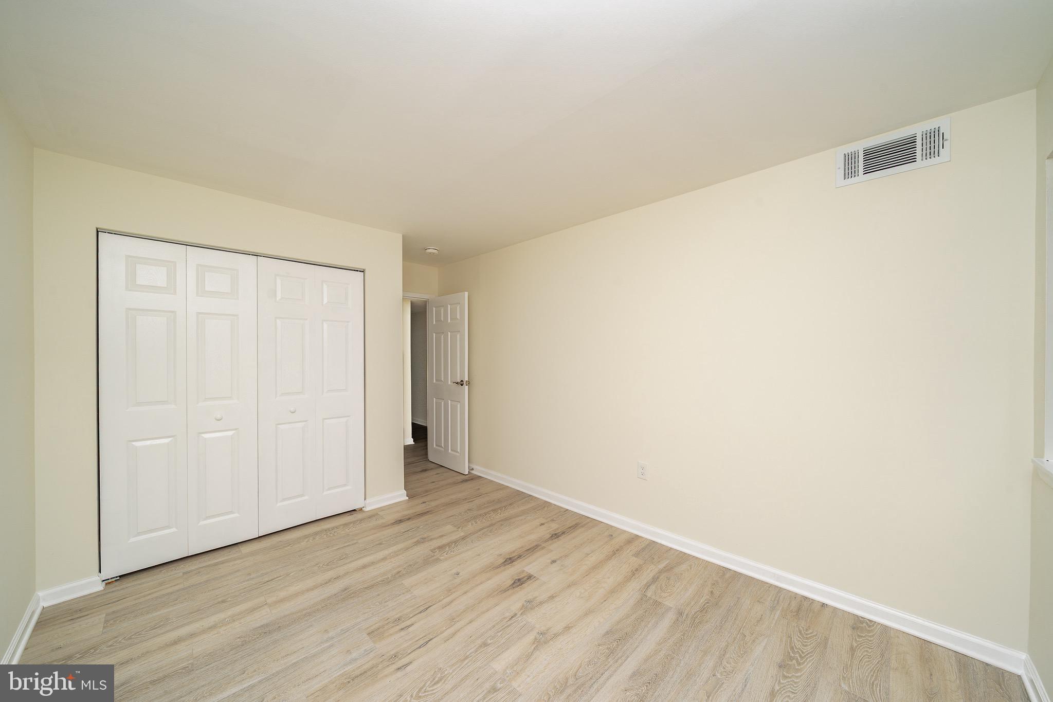 9910 Walker House Road, Unit 99104 Gaithersburg, MD 20886 - Photo 29 of 32 a view of an empty room