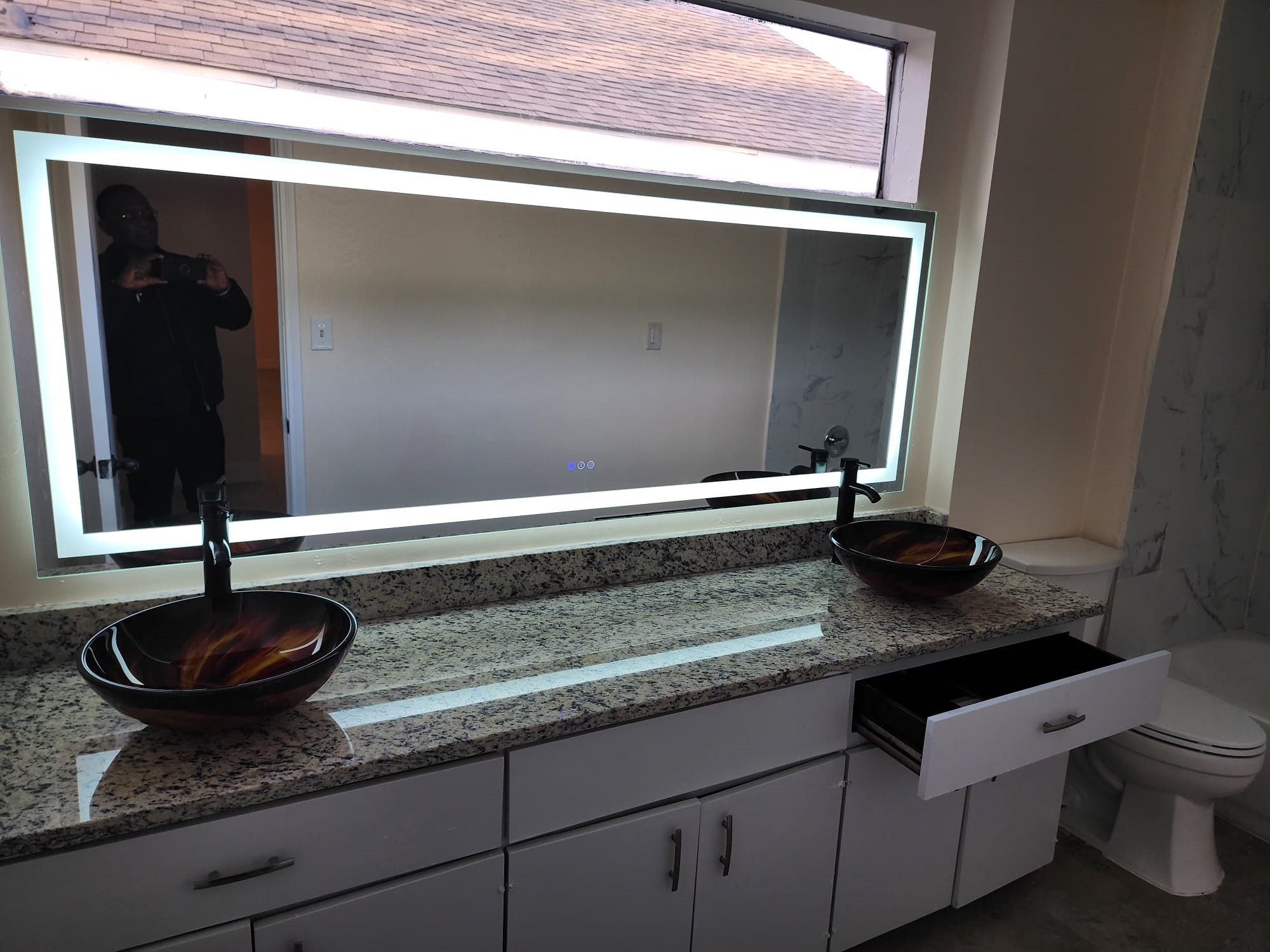 12534 Riva Ridge Lane Missouri City, TX 77071 - Photo 28 of 28 a bathroom with a granite countertop sink and a mirror