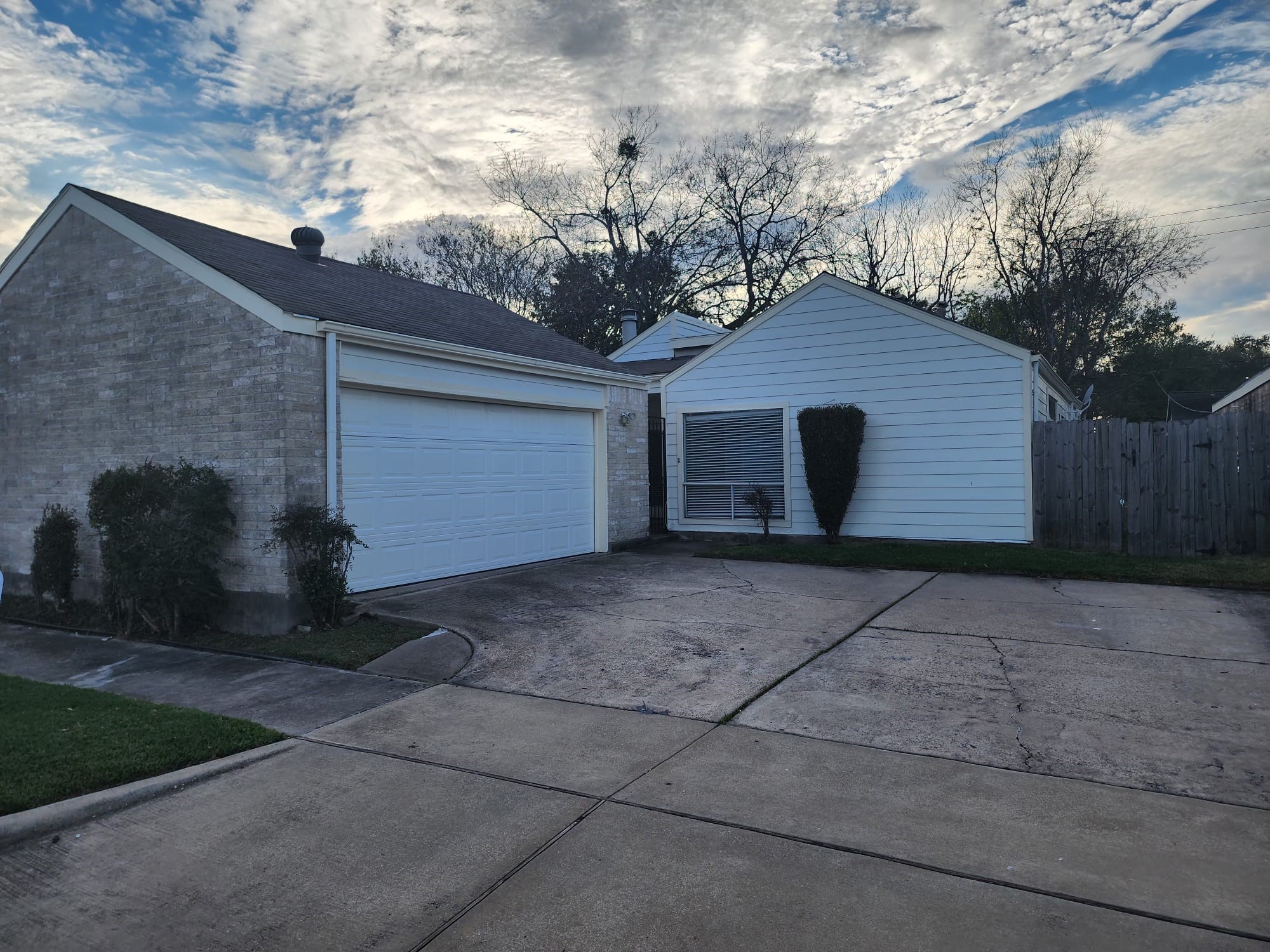 12534 Riva Ridge Lane Missouri City, TX 77071 - Photo 7 of 28 a front view of a house with a yard and garage
