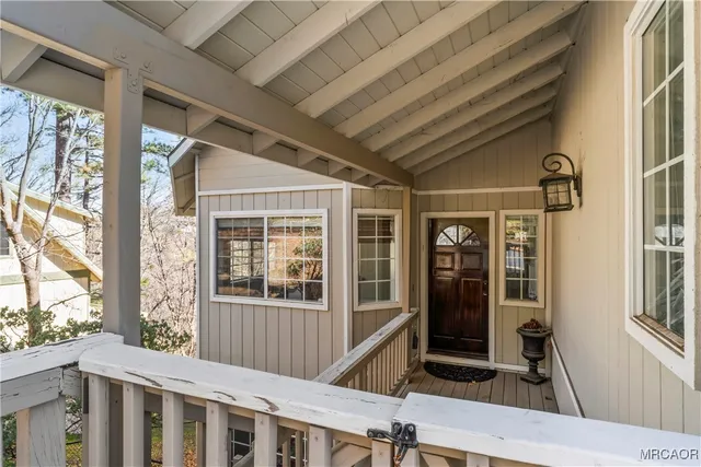a front view of a house with a porch