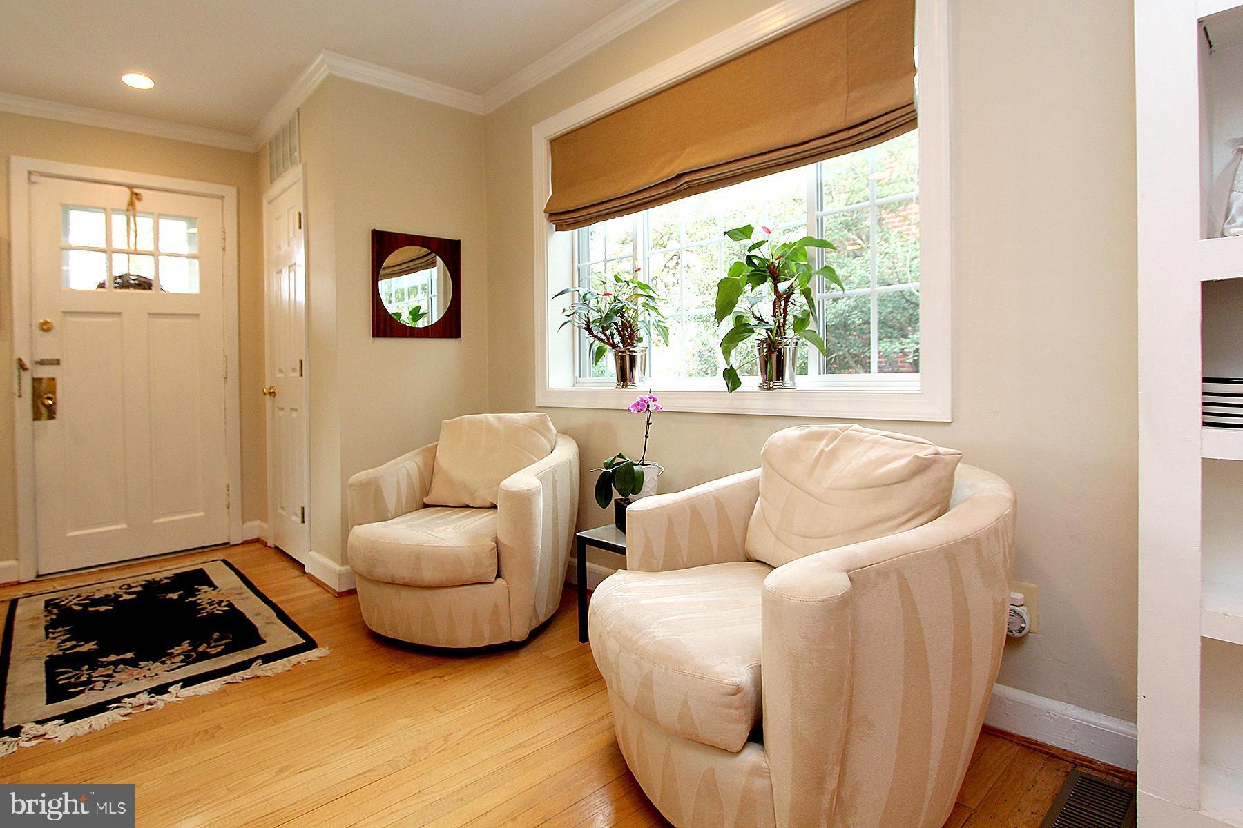 805 Stirling Road Silver Spring, MD 20901 - Photo 12 of 29 a living room with furniture and a large window