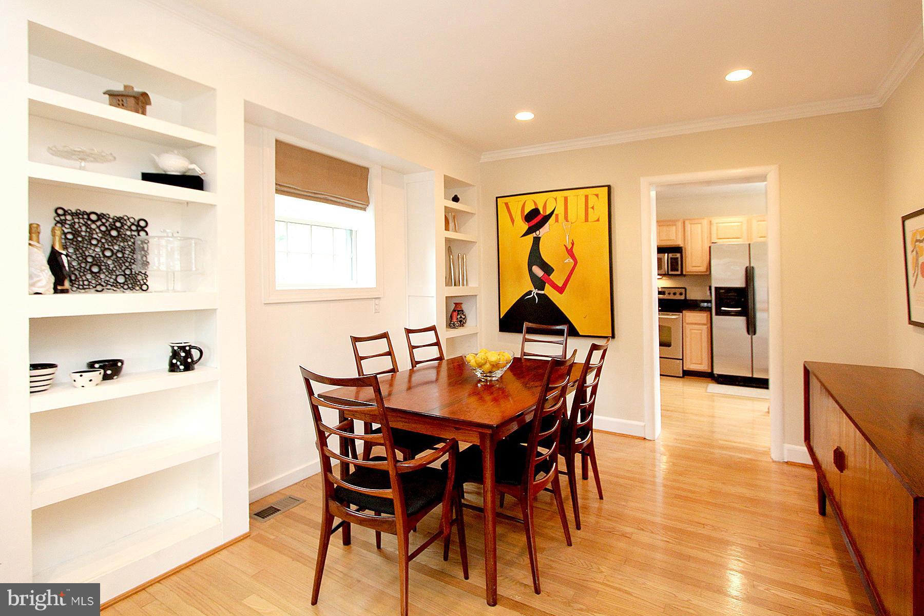805 Stirling Road Silver Spring, MD 20901 - Photo 14 of 29 a view of a dining room with furniture and wooden floor