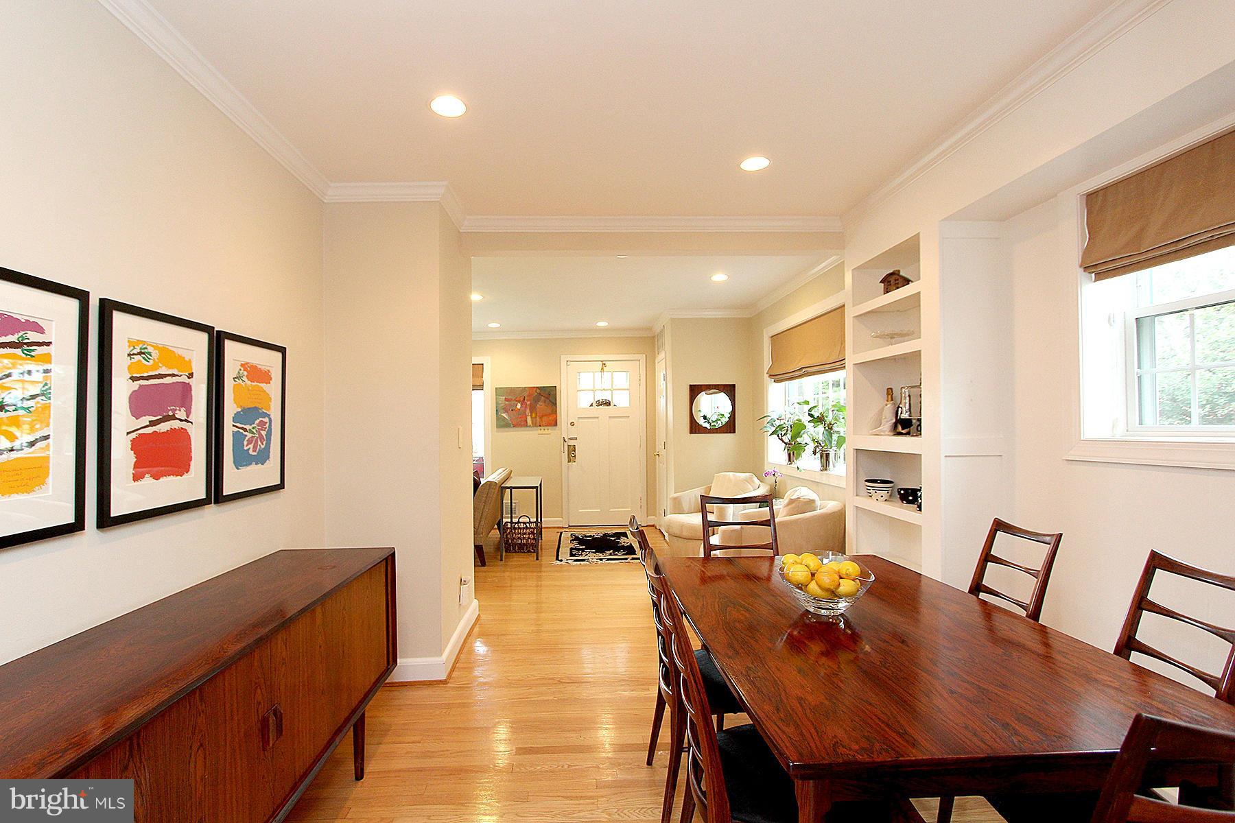 805 Stirling Road Silver Spring, MD 20901 - Photo 15 of 29 a view of a dining room with furniture and wooden floor
