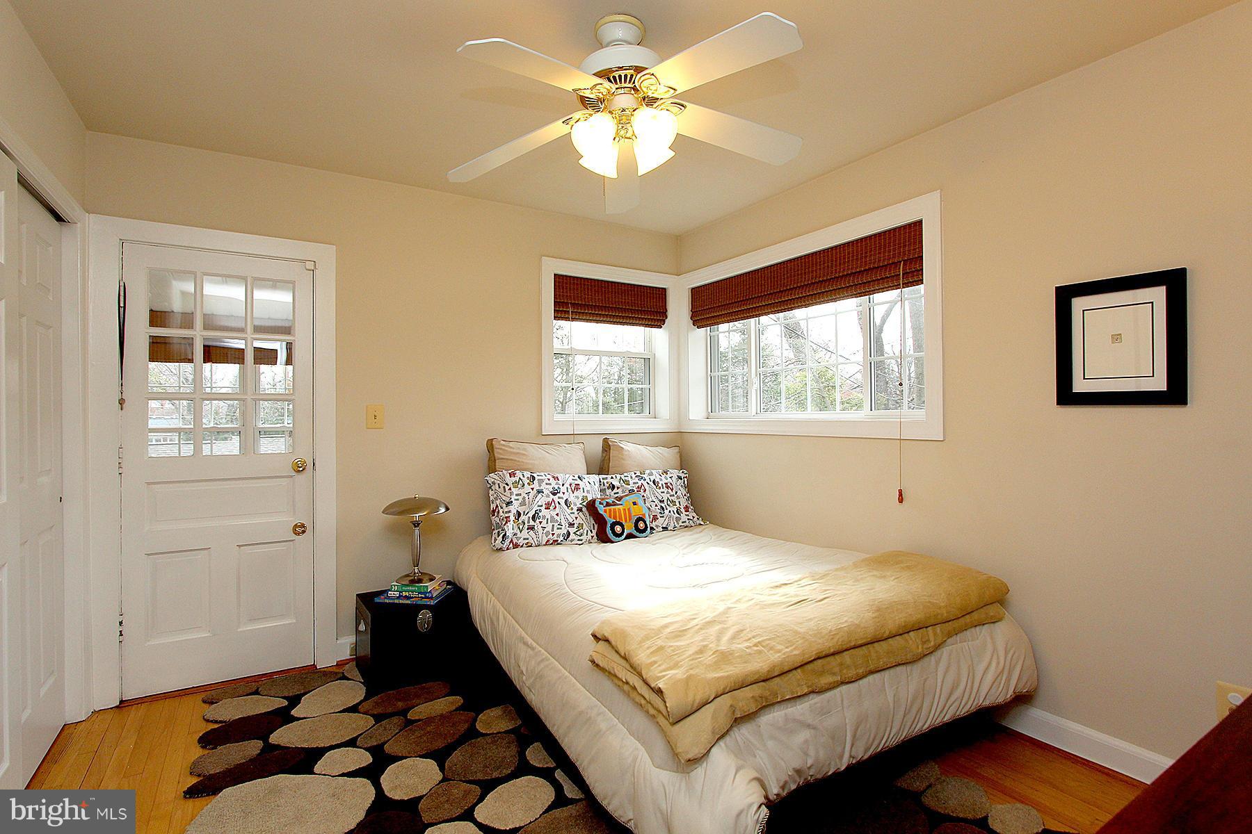 805 Stirling Road Silver Spring, MD 20901 - Photo 22 of 29 a bedroom with a bed and window