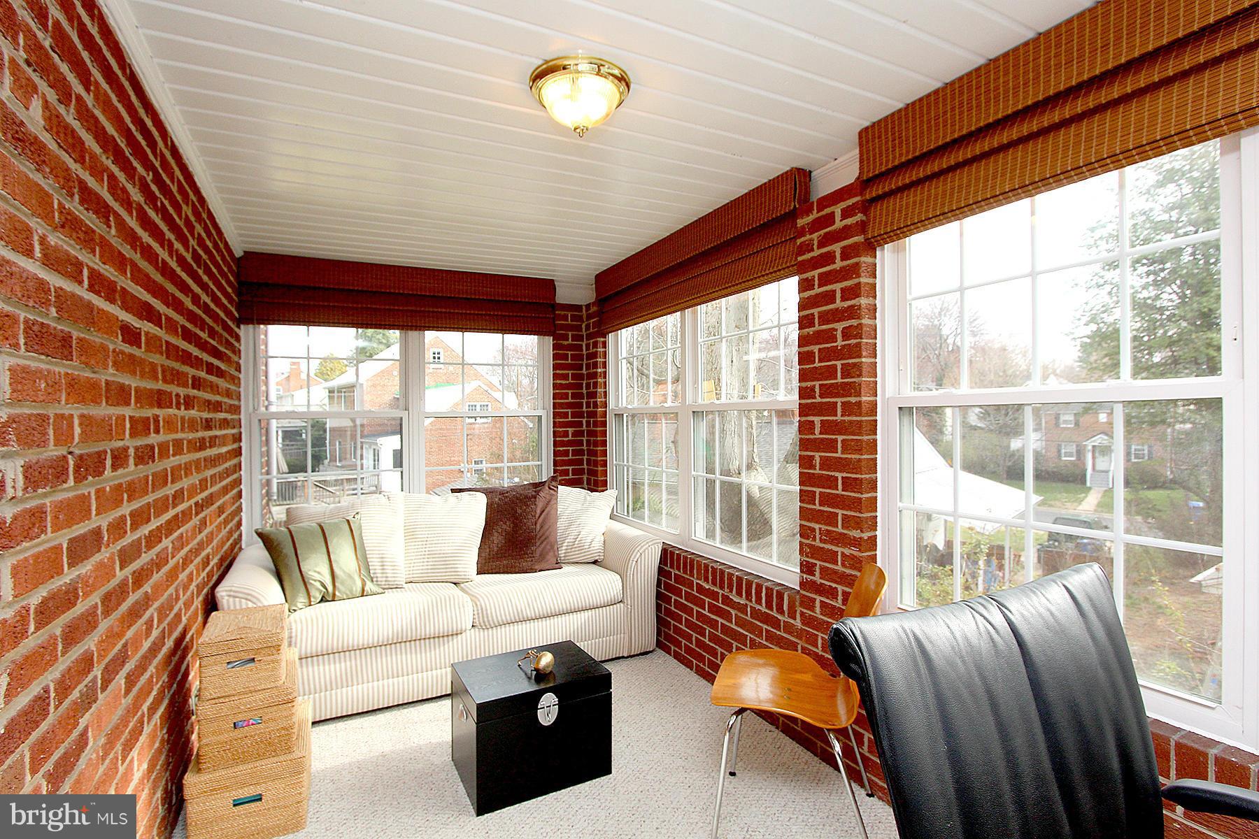 805 Stirling Road Silver Spring, MD 20901 - Photo 23 of 29 a living room with furniture and a large window