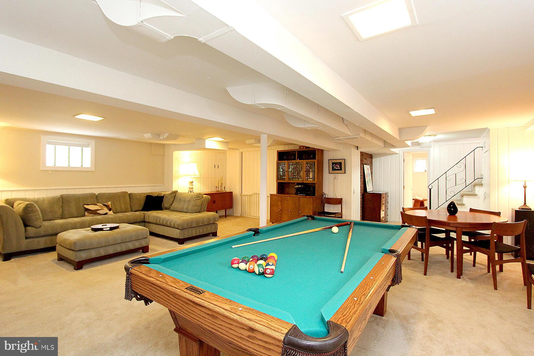 805 Stirling Road Silver Spring, MD 20901 - Photo 27 of 29 a room with pool table table and chairs