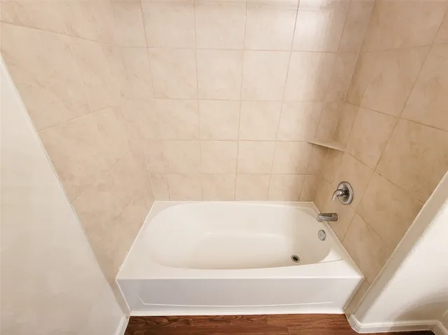 a bathroom with a bathtub