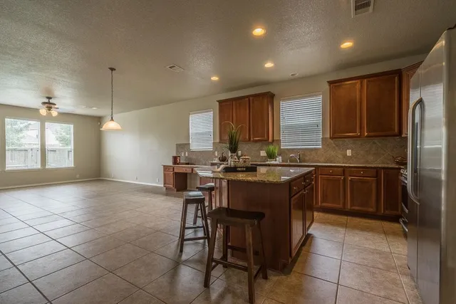 a view of a house with a garage
