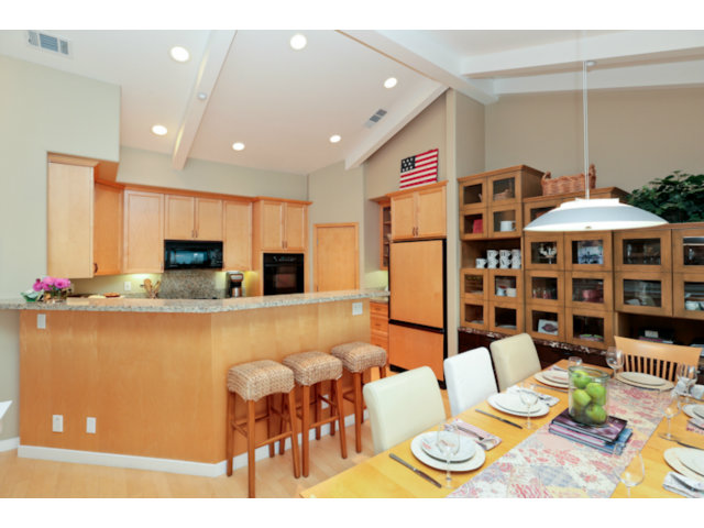 192 Seacliff Drive Aptos, CA 95003 - Photo 12 of 25 a kitchen with stainless steel appliances granite countertop a sink and cabinets
