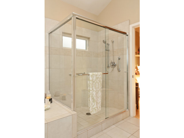192 Seacliff Drive Aptos, CA 95003 - Photo 15 of 25 a bathroom with a glass shower door