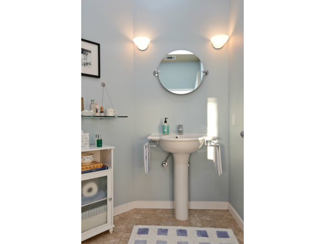 192 Seacliff Drive Aptos, CA 95003 - Photo 16 of 25 a bathroom with a sink a toilet and a mirror