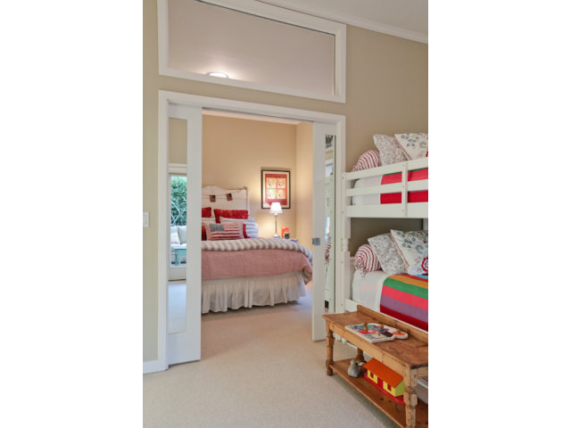 192 Seacliff Drive Aptos, CA 95003 - Photo 19 of 25 a bedroom with a bed and a cabinets