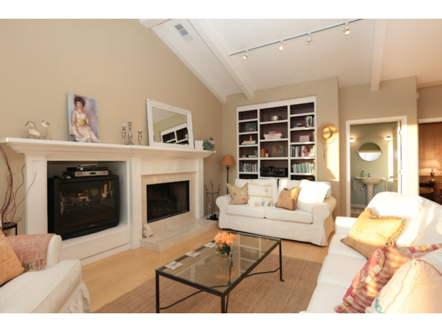 192 Seacliff Drive Aptos, CA 95003 - Photo 7 of 25 a living room with furniture and a fireplace