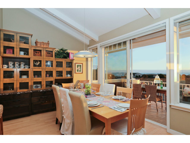 192 Seacliff Drive Aptos, CA 95003 - Photo 8 of 25 a view of a dining room with furniture window and wooden floor