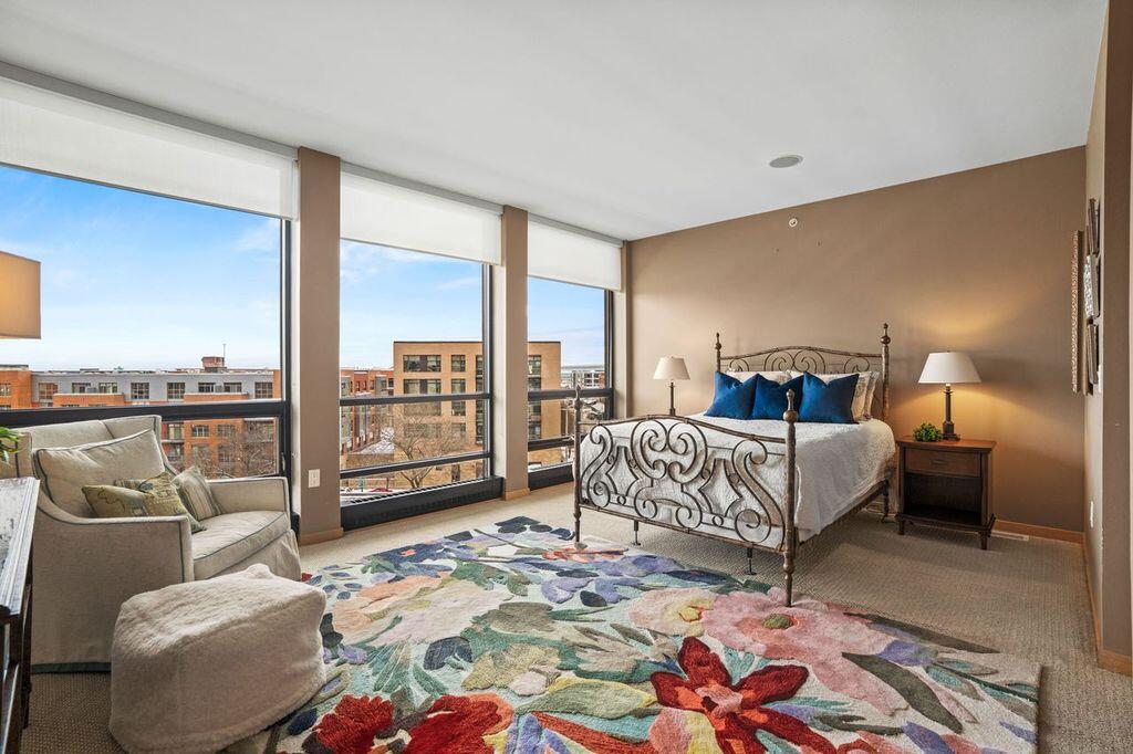 311 East Erie Street, Unit 425 Milwaukee, WI 53202 - Photo 26 of 46 Primary BR with stunning skyline views