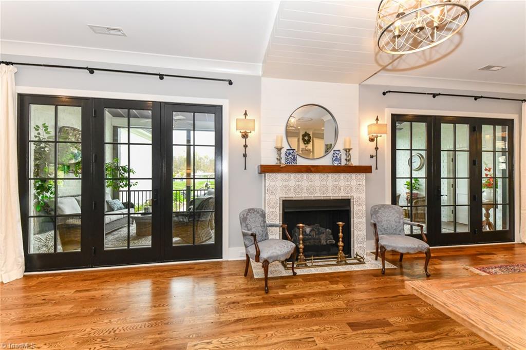2195 Mizpah Church Road Rural Hall, NC 27045 - Photo 16 of 50 Statement doors lead to screened-in porch overlooking inground pool