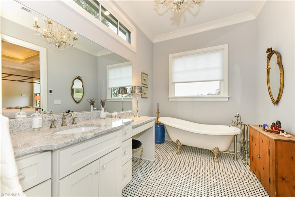 2195 Mizpah Church Road Rural Hall, NC 27045 - Photo 23 of 50 Claw foot tub and vanity in primary suite