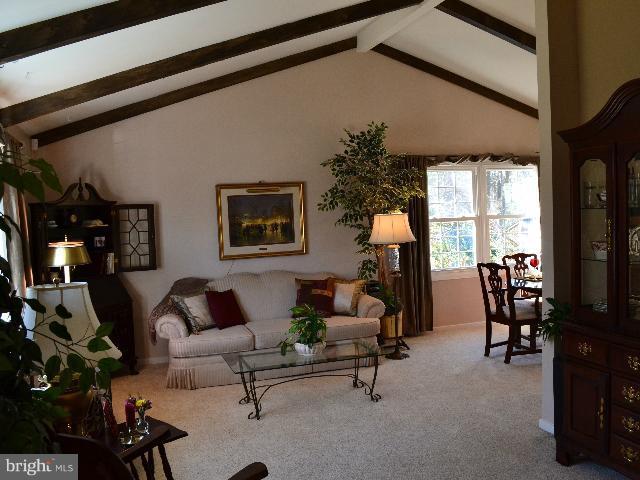 2106 Thomas View Road Reston, VA 20191 - Photo 1 of 29 a living room with furniture and a large window