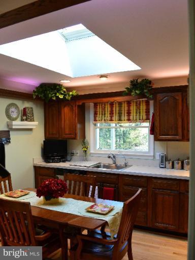 2106 Thomas View Road Reston, VA 20191 - Photo 23 of 29 a kitchen with a stove a sink and a refrigerator