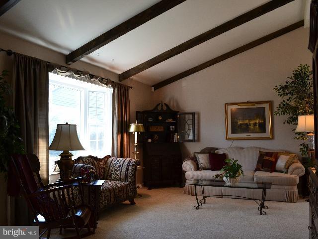 2106 Thomas View Road Reston, VA 20191 - Photo 24 of 29 a living room with furniture and wooden floor