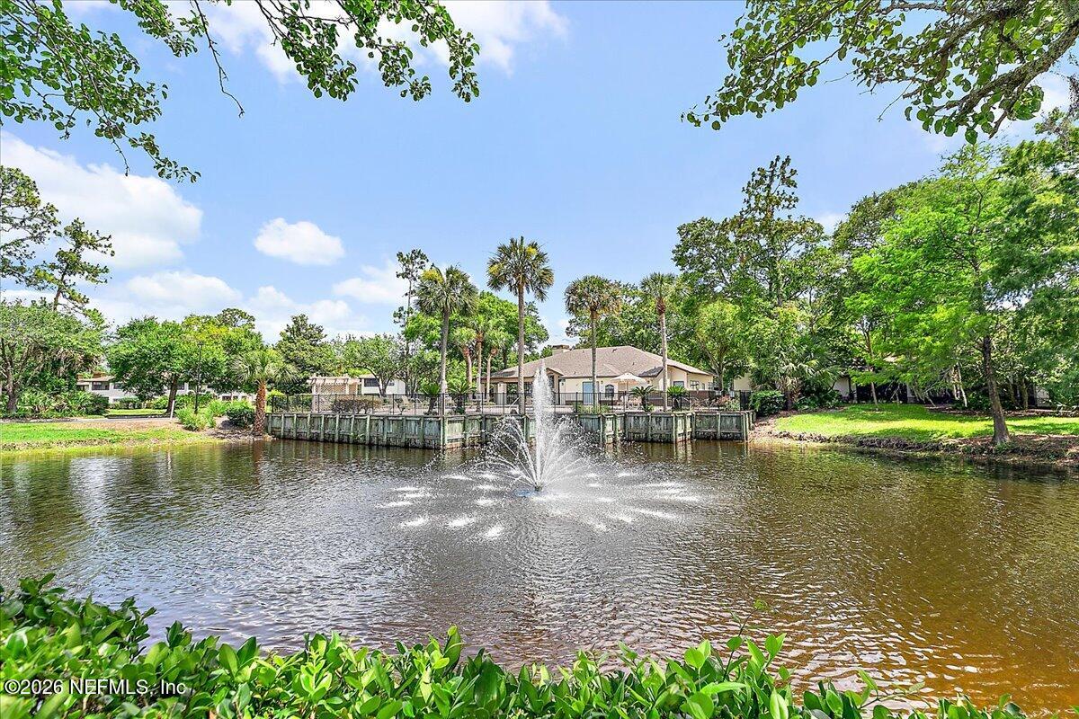10150 Belle Rive Boulevard, Unit 204 Jacksonville, FL 32256 - Photo 11 of 19 11-Pond to Clubhouse