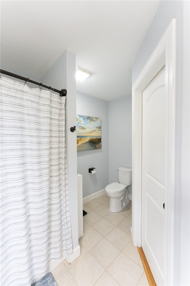 696 Mt Olivet Road Six Mile, SC 29682 - Photo 13 of 35 This bathroom features pristine tile flooring and a functional layout.