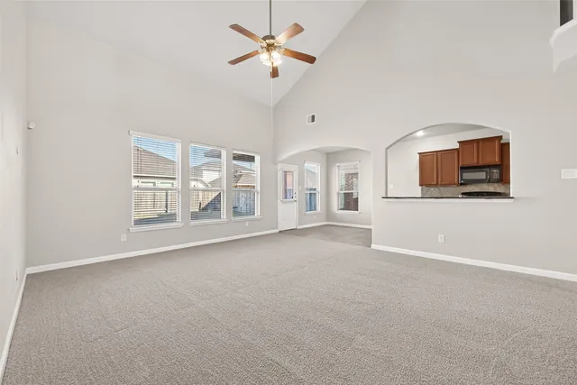 a kitchen with granite countertop stainless steel appliances and sink