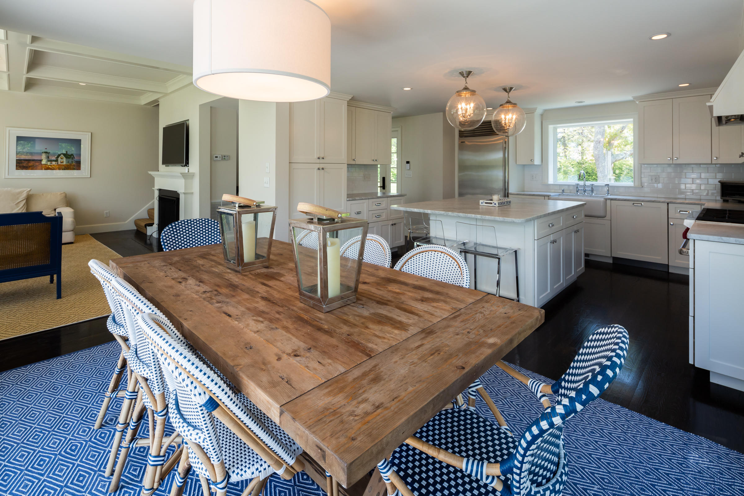 60 Tappan Drive Chatham, MA 02633 - Photo 14 of 46 a dining room with table chairs and kitchen view