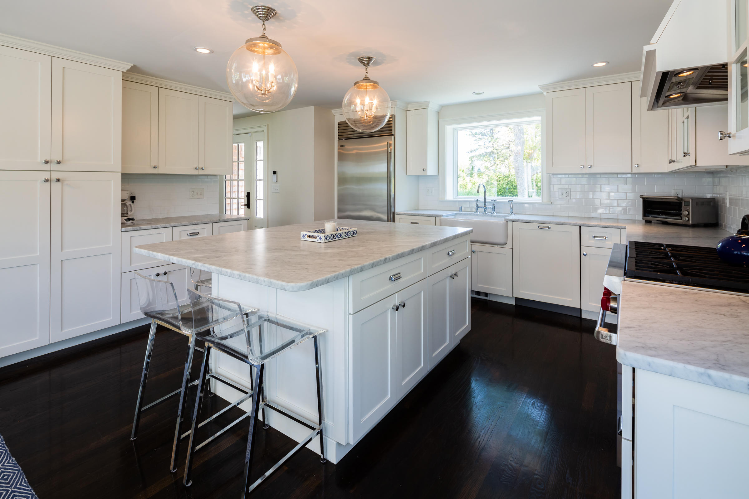 60 Tappan Drive Chatham, MA 02633 - Photo 15 of 46 a kitchen with a center island appliances and cabinets