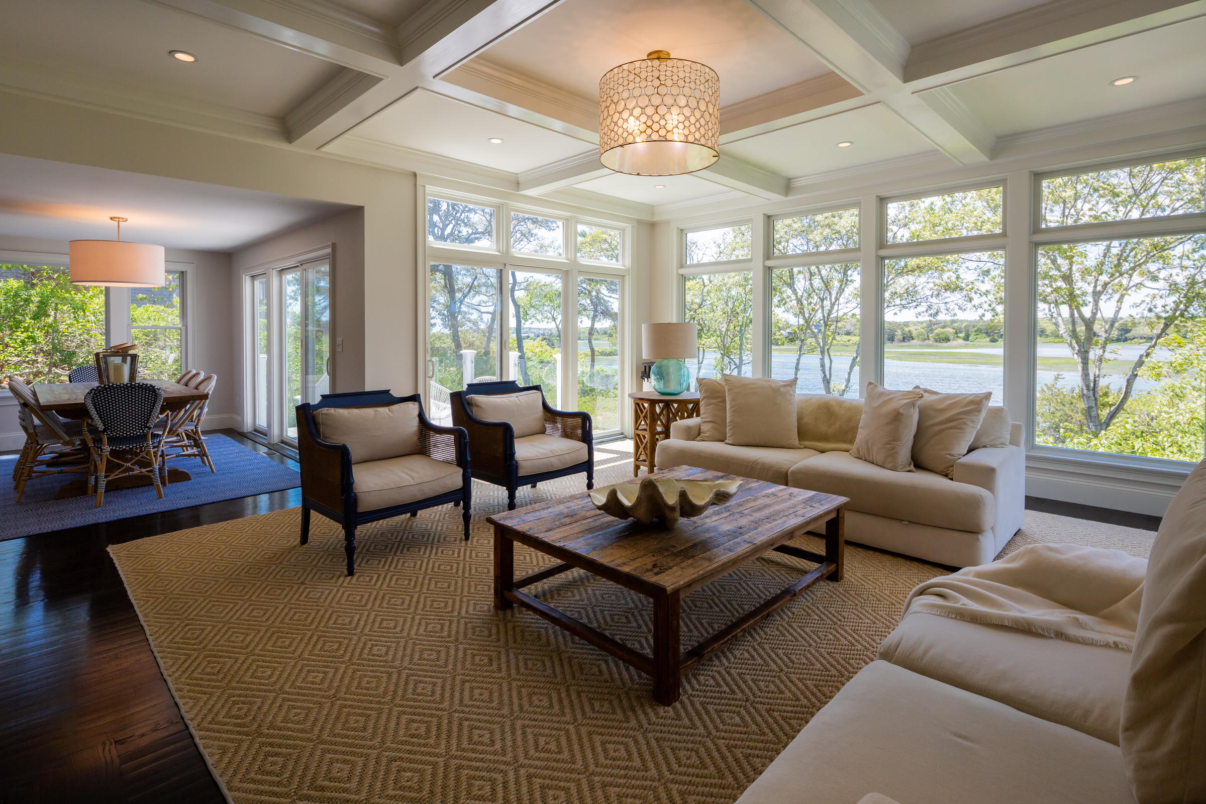 60 Tappan Drive Chatham, MA 02633 - Photo 17 of 46 a living room with furniture and a chandelier