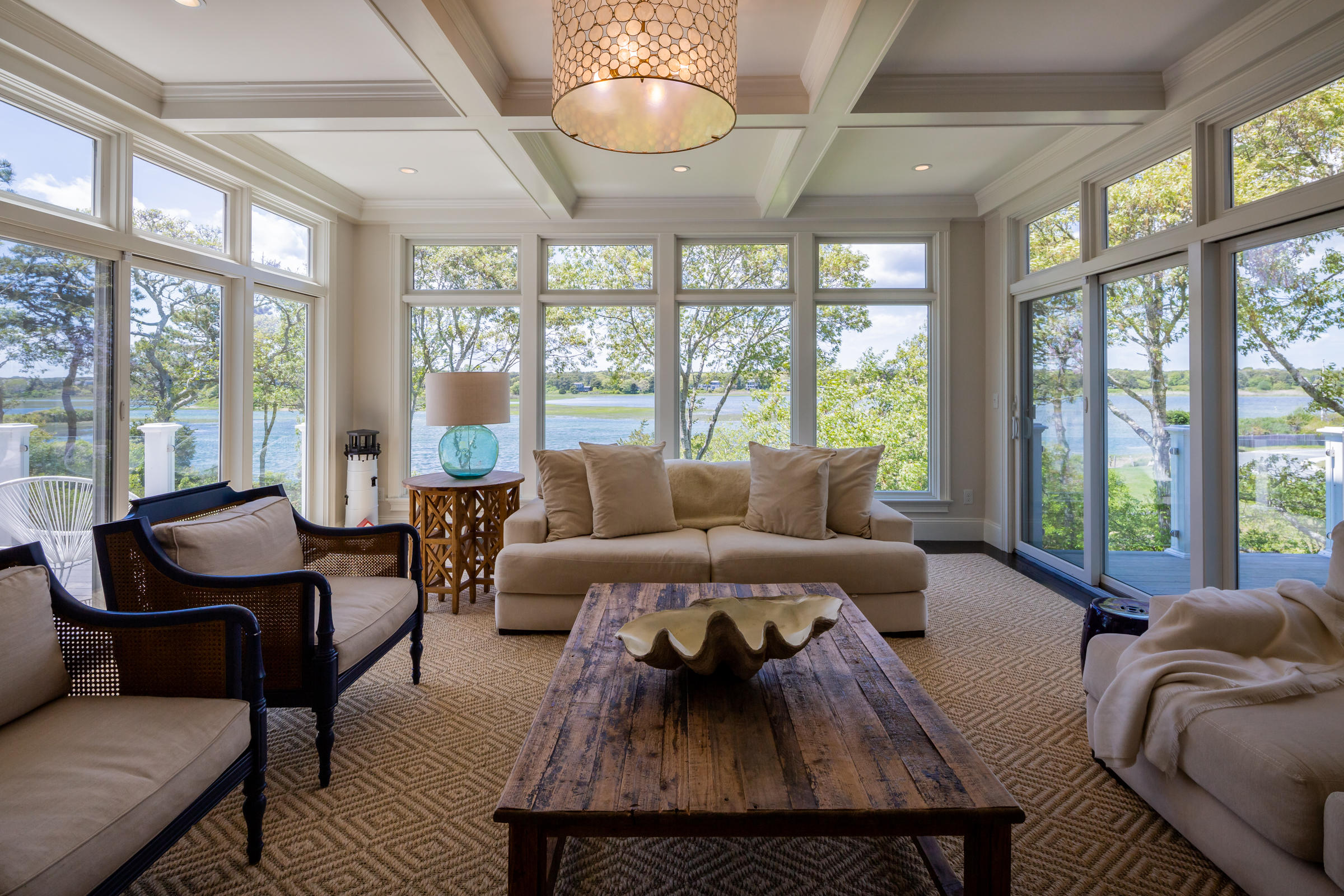 60 Tappan Drive Chatham, MA 02633 - Photo 18 of 46 a living room with furniture and a large window