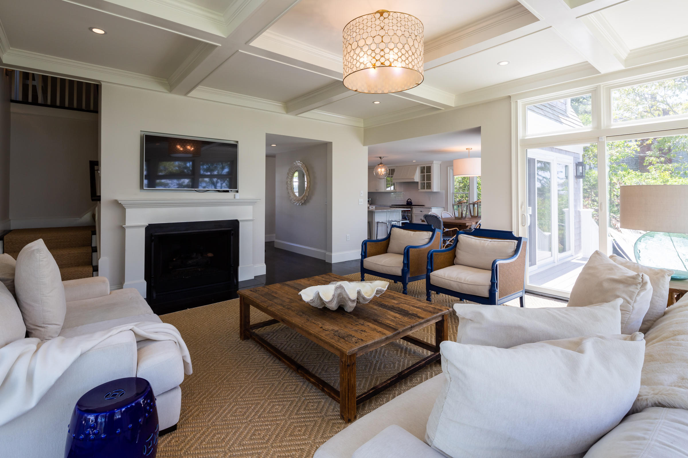 60 Tappan Drive Chatham, MA 02633 - Photo 19 of 46 a living room with furniture a flat screen tv and a fireplace