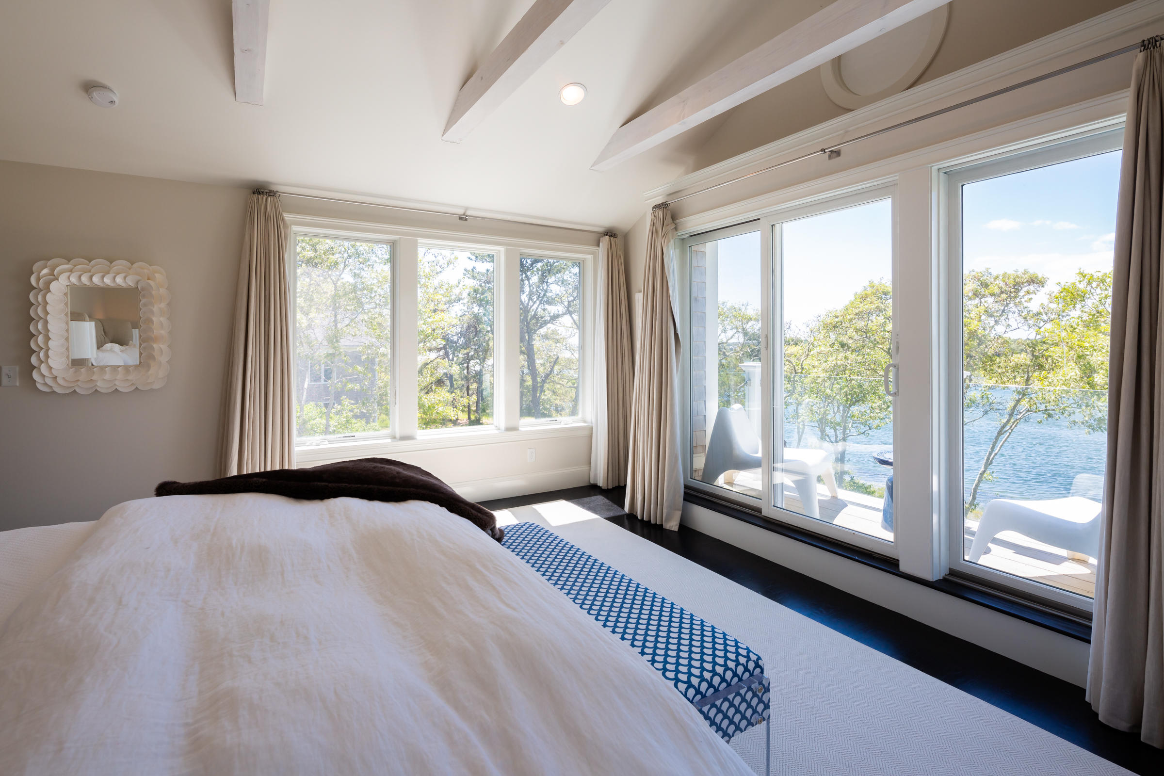 60 Tappan Drive Chatham, MA 02633 - Photo 29 of 46 a bedroom with a large bed and a large window