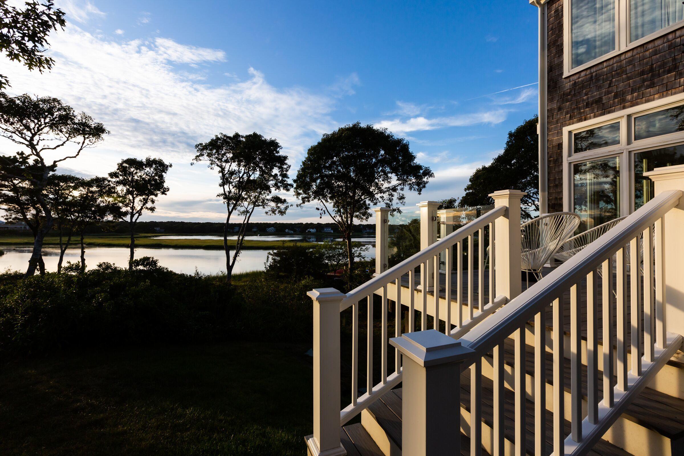 60 Tappan Drive Chatham, MA 02633 - Photo 35 of 46 a view of balcony with two chairs and wooden floor