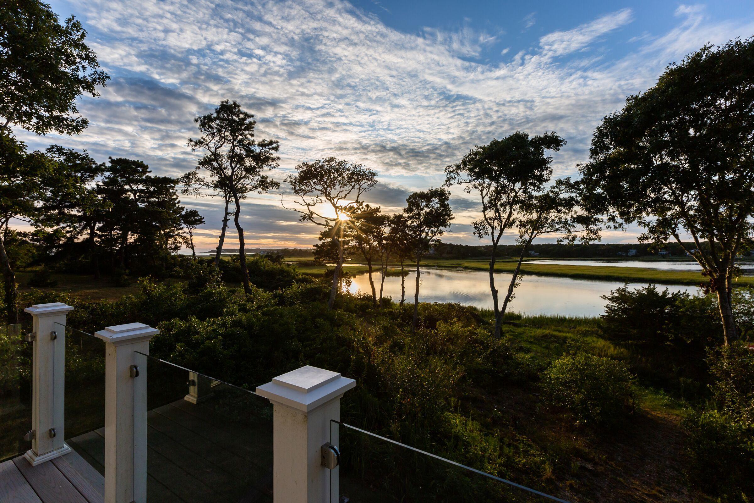 60 Tappan Drive Chatham, MA 02633 - Photo 40 of 46 a lake view with boat and palm trees