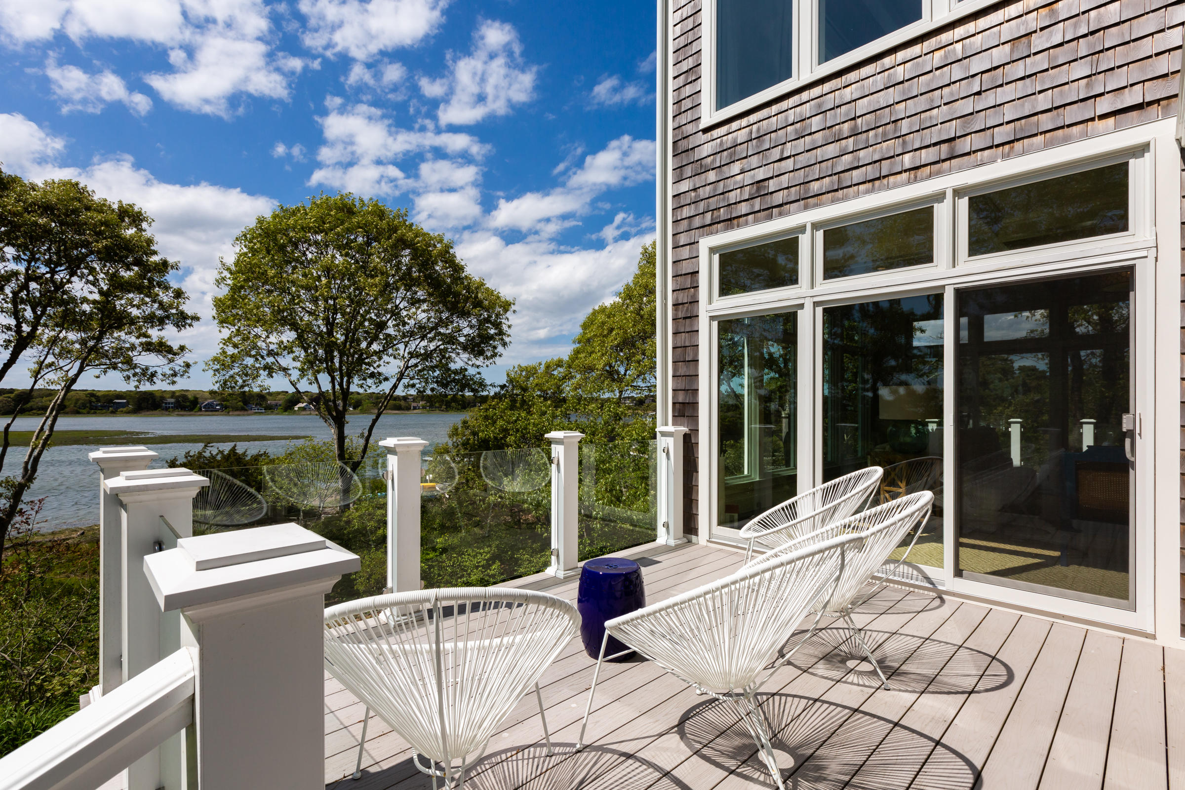 60 Tappan Drive Chatham, MA 02633 - Photo 10 of 46 a view of a patio with a table and chairs