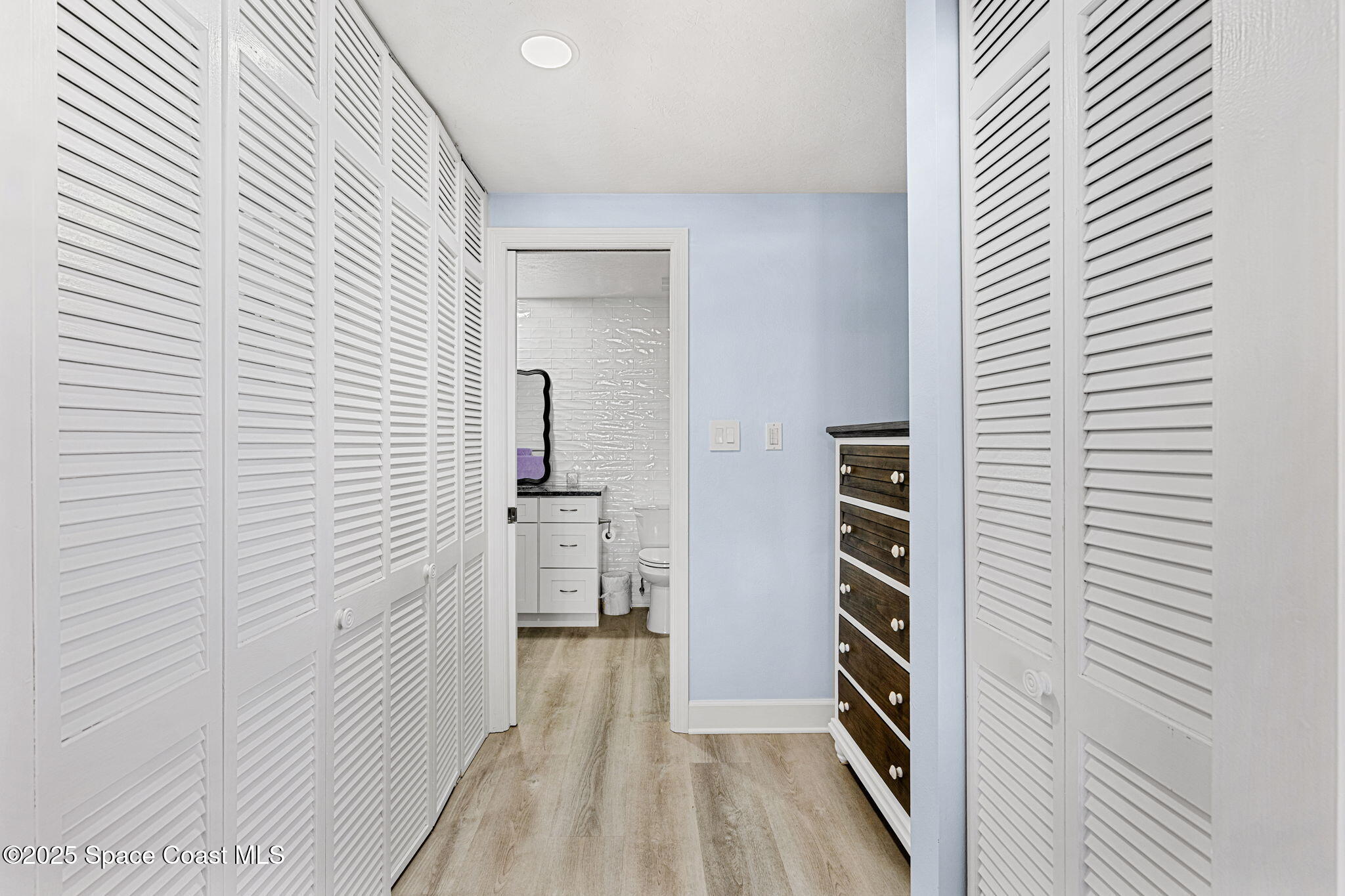 1208 East River Drive, Unit 201 Melbourne, FL 32901 - Photo 26 of 59 His & Her Closets
