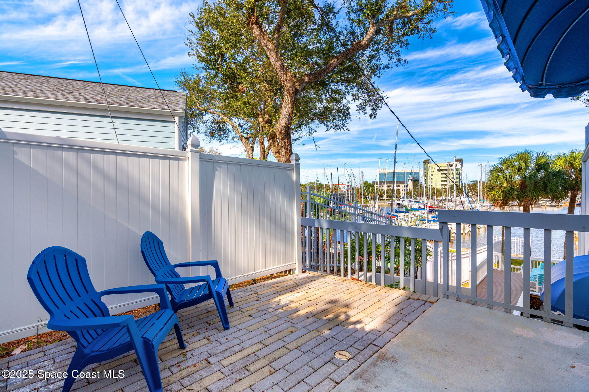1208 East River Drive, Unit 201 Melbourne, FL 32901 - Photo 31 of 59 Private Guest Bedroom Courtyard views