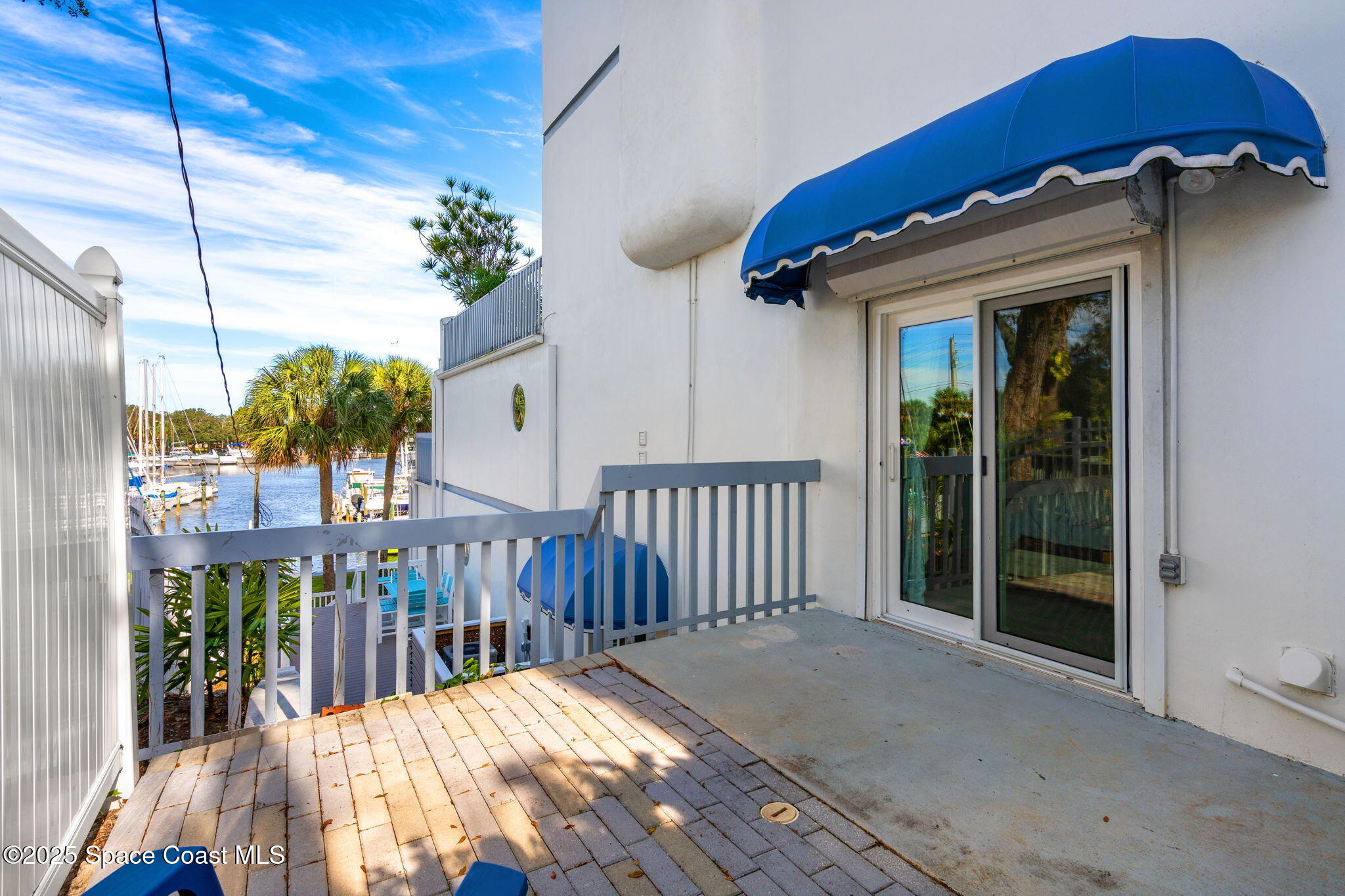 1208 East River Drive, Unit 201 Melbourne, FL 32901 - Photo 32 of 59 Private Guest Bedroom Courtyard views
