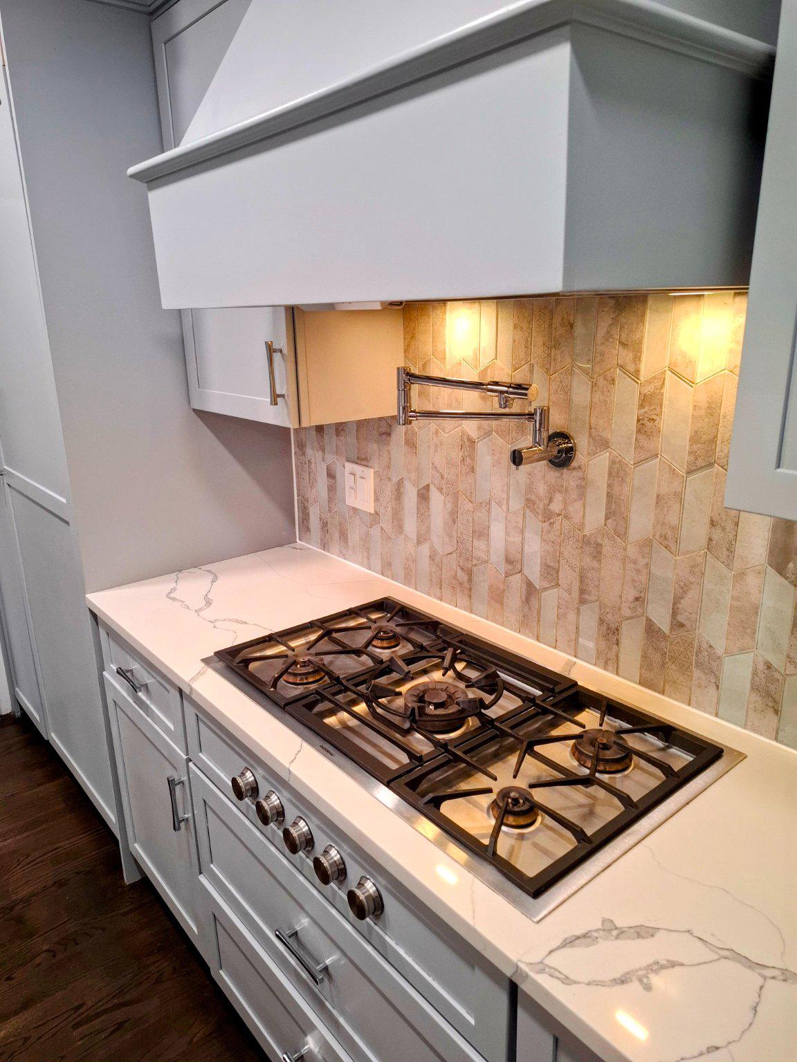 9901 Belhaven Road Bethesda, MD 20817 - Photo 14 of 32 Gaggenau range top with pot filler