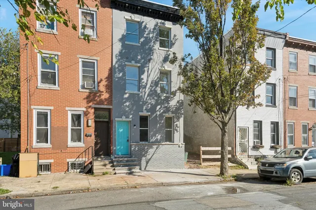 a front view of a building with street