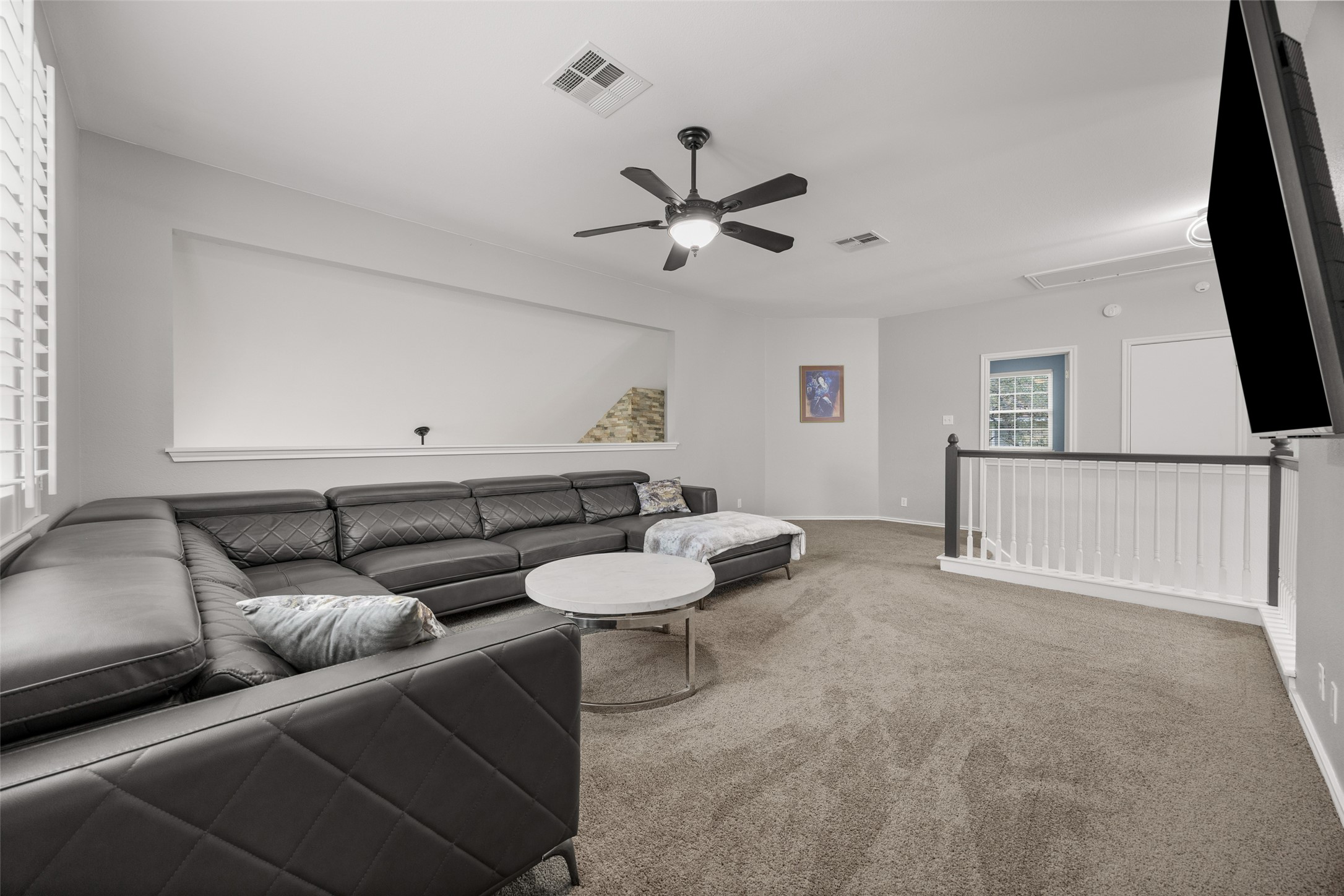 8610 Axis Drive Austin, TX 78749 - Photo 17 of 29 a living room with furniture and a window