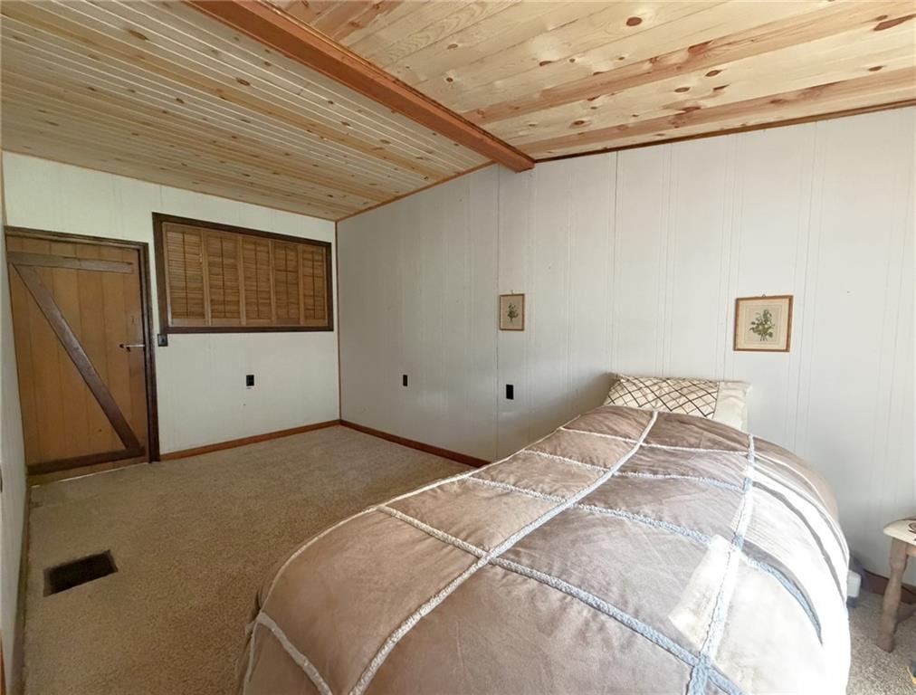 219 Noel Road Latrobe, PA 15650 - Photo 19 of 27 a bedroom with a bed and a wall painting