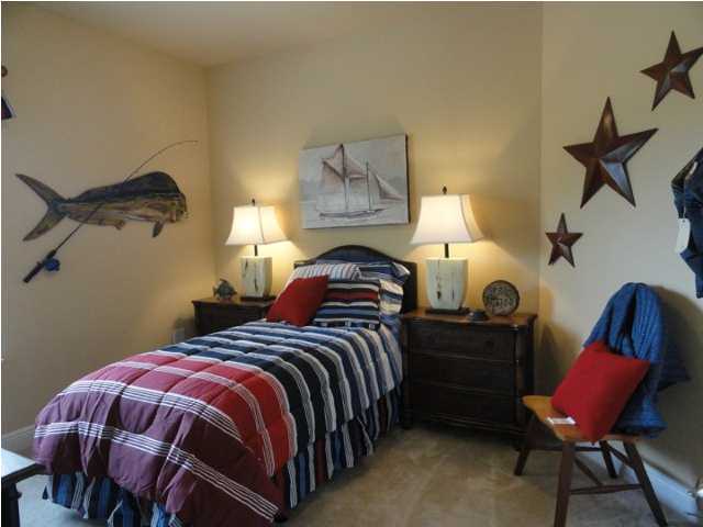 Lot 277 Riverbirch Loop Santa Rosa Beach, FL 32459 - Photo 4 of 8 a bedroom with bed and a chair
