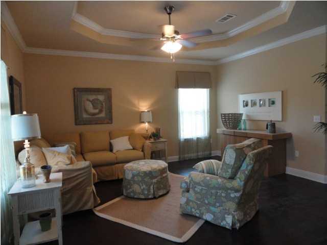 Lot 277 Riverbirch Loop Santa Rosa Beach, FL 32459 - Photo 6 of 8 a living room with furniture and a chandelier