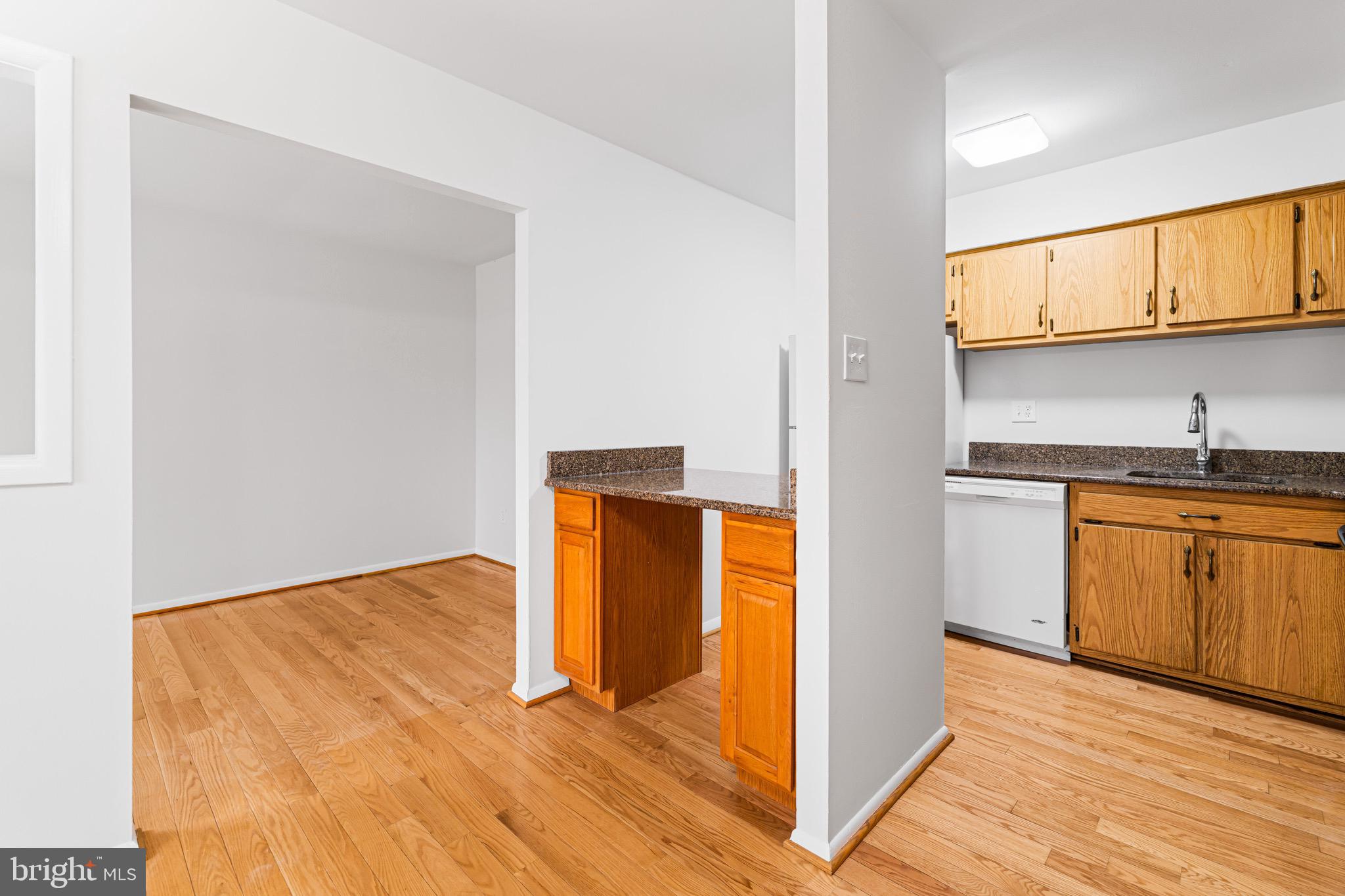 22 Fitzwatertown Road, Unit C8 Willow Grove, PA 19090 - Photo 9 of 26 Dining Area view into Den