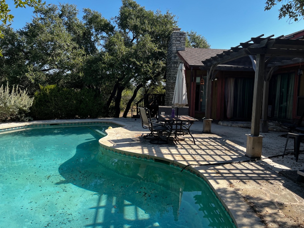 319 Fawnridge Street Georgetown, TX 78628 - Photo 21 of 24 a view of a house with backyard and sitting area