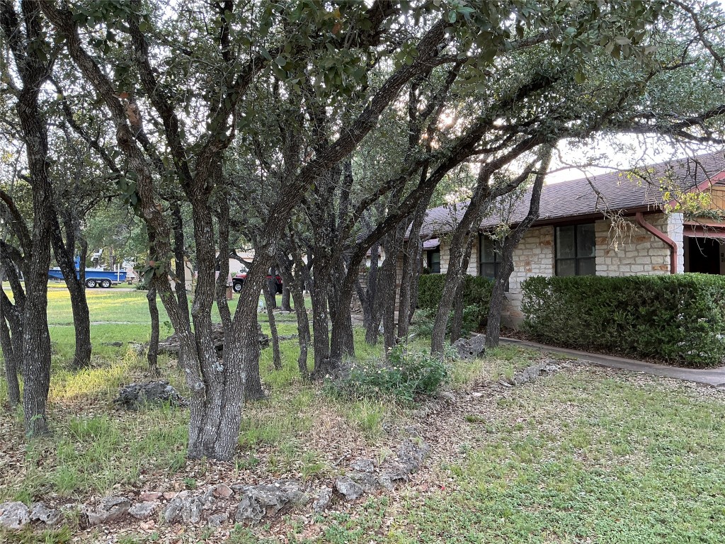 319 Fawnridge Street Georgetown, TX 78628 - Photo 3 of 24 a backyard of a house with lots of green space