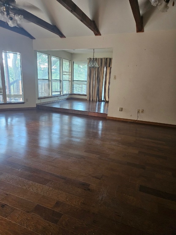 319 Fawnridge Street Georgetown, TX 78628 - Photo 7 of 24 an empty room with wooden floor and windows