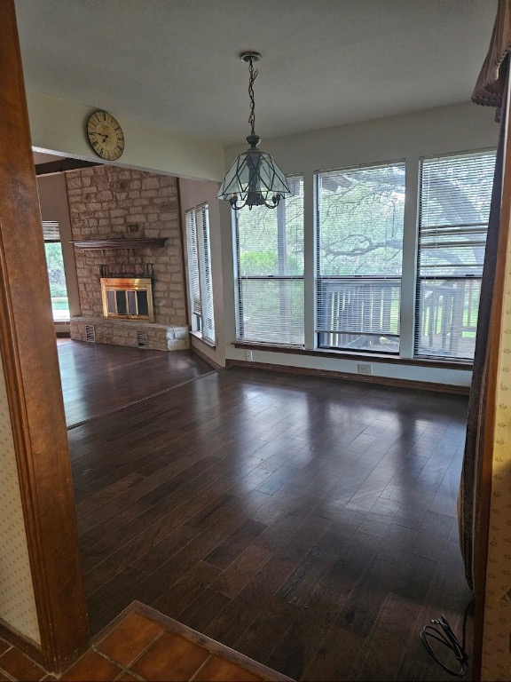 319 Fawnridge Street Georgetown, TX 78628 - Photo 8 of 24 a view of an empty room with wooden floor and a window